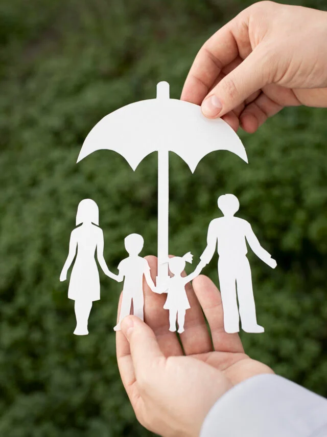 cropped-close-up-hands-holding-paper-family